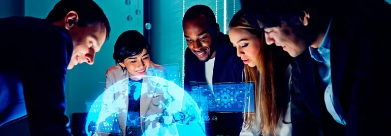 Group of professionals discussing global data projections on a digital interface.