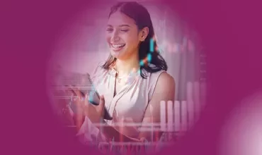 Person smiling at a tablet with digital graphs overlay.